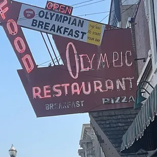 a neon sign for a restaurant