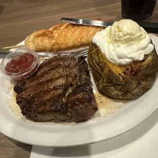 I had a great steak dinner with loaded potato and some shrimp. It was delicious and perfect.