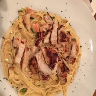 Cajun fettuccine Alfredo really good. Grilled chicken over cooked. Plenty of food. Take some home.