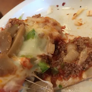 They do cook their own beef. All in all, a fairly good pizza. Just not great.