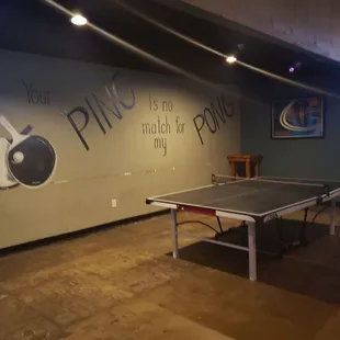 a ping pong table in a room