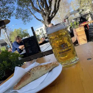 Weihenstephan and spanakopita on the Biergarten patio.