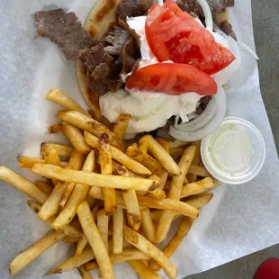 a plate of food with fries