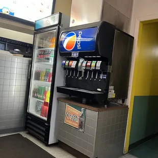 a soda dispenser and a soda machine