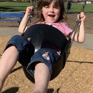My daughter swinging on the swings, too cute!