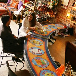 World's Only Tibetan Sand Painting under glass at a Tea Bar! Lobby of OM Rental Hall
