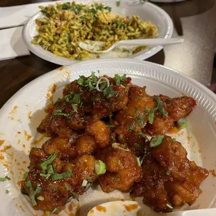 Gobi Manchurian and Bhel Puri with Mango Lassi in the back
