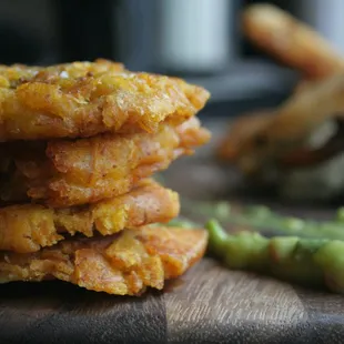 Patacones: Crispy Green Plantain Chips with Avocado Sauce
