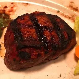 a steak and vegetables on a plate