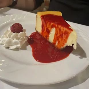 New York cheesecake with strawberry sauce