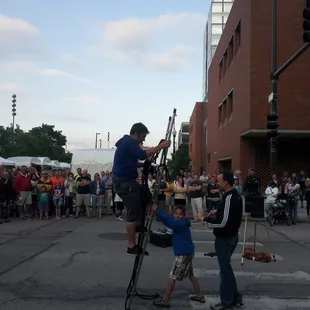 Shaun and Tim help set up the ladder and the jokes