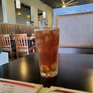 Lychee iced tea with lychee fruit at the bottom