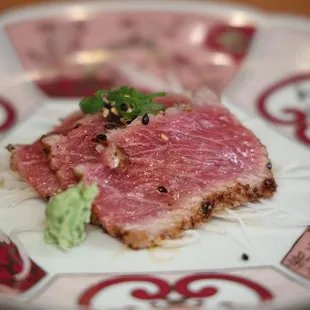 a close up of a piece of meat on a plate