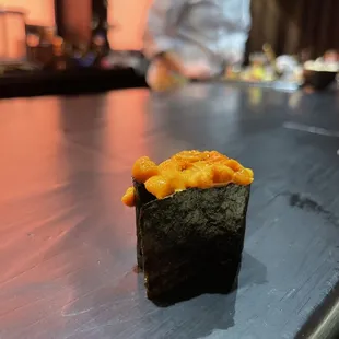 a sushi roll on a table