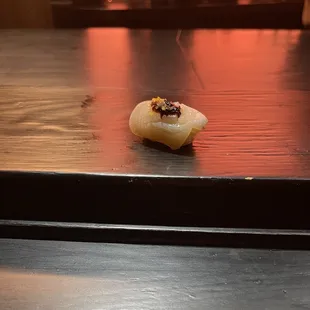 Scallop with preserved lemon and plum sauce