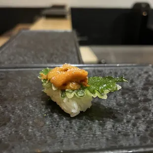 Uni with fried leaf