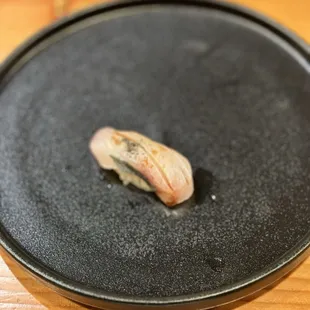 a close up of a sushi dish