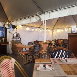 Outdoor dining under the tent.