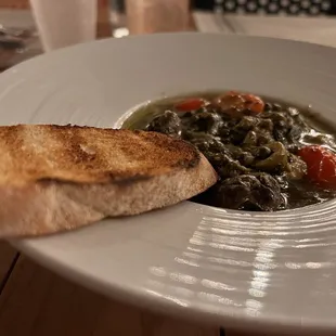 Escargot. Over powering. Too vinegary and tart. Not good 3/10