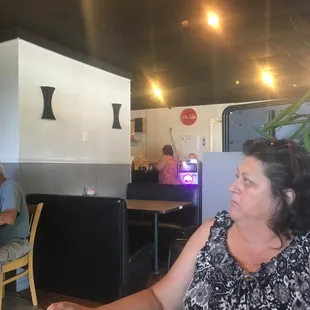 a woman sitting at a table