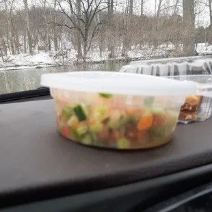 a salad in a plastic container