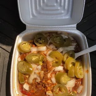 Chilli, cheese , jalapeño and onion