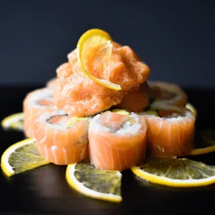 Orange Ball: Salmon, avocado, mild spicy salmon, meyer lemon sauce, sliced orange