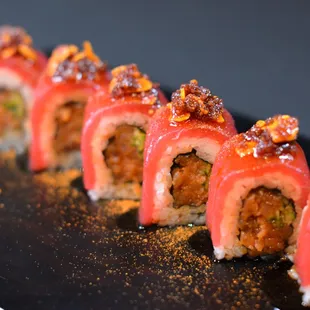 Golden Gate: Spicy tuna, cucumber, tuna,  cayenne pepper, sweet and spicy sauce, roasted garlic chips