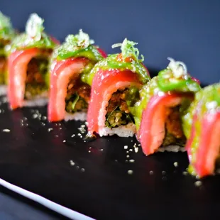 Josee: Spicy tuna, cucumber, cilantro, tuna, jalapeno, cilantro sauce, chili sauce, green onion, dried cilnatro