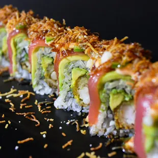 Big Daddy: Shrimp tempura, avocado, tuna, three spicy sauce, jalapeno, macademia nuts, sweet potato crunch, eel sauce