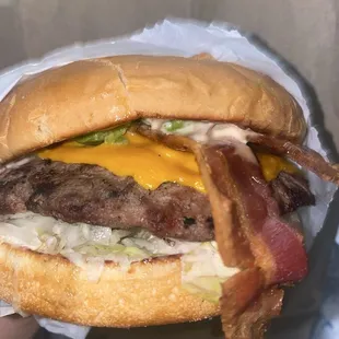 Close-up of Bacon Cheeseburger.