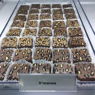 a variety of chocolates in a display case