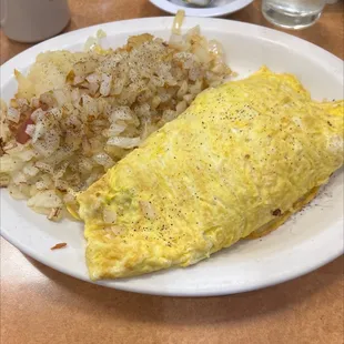 an omelet and potatoes
