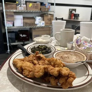 Fried chicken breast with pintos and collards