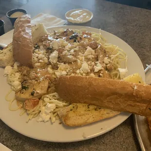 Greek Pasta with Alfredo and a side of chicken. Sooo good. It&apos;s not on the menu so ask for Angel&apos;s pasta.