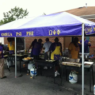 Lamda Omega Brothers setting owt the Pancake Extravaganza