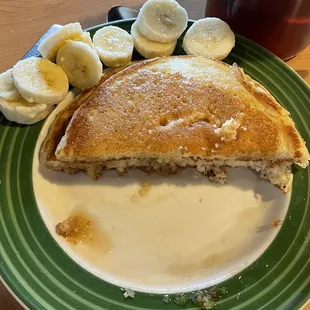 Pancakes with bananas, when I asked to add bananas I figured it was understood to have them cooked in the pancake. Not thrown on top