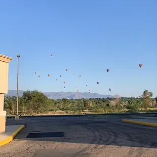 several hot air balloons in the sky