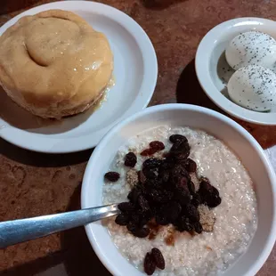 The oatmeal side ($4.99).  Cinnamon roll ($6.99). 2 eggs ($2.99).