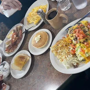 Steak omelette, pancakes, French toast, bacon, sourdough bread