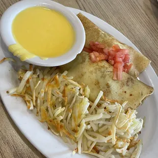 Spinach crepes w/hollandaise sauce on the side.