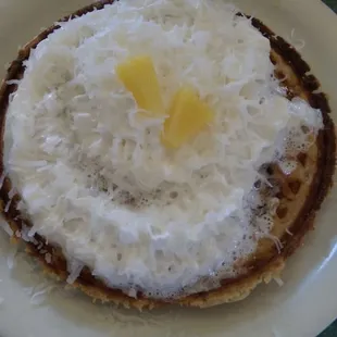 Coconut mixed in the batter and sprinkle on top!