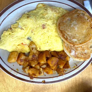 Omelet with onions, tomatoes, cheese and sausage. Grilled English muffins.