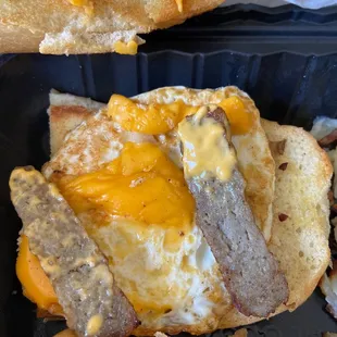 Sausage, cut in half on breakfast sandwich