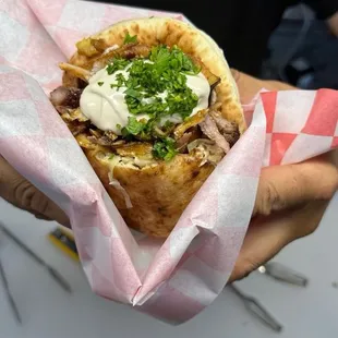Pita shawarma with tahini and spicy