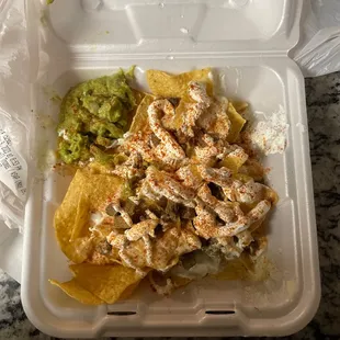 Lengua Nachos after i tried to add some seasoning to it since it was so bland and nasty