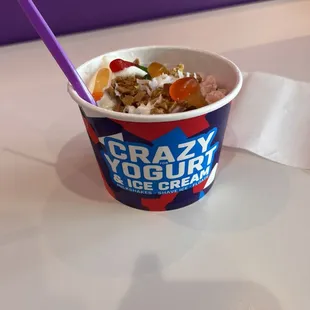 Coconut yogurt and euro tart yogurt with mochi, coconut and gummy worms