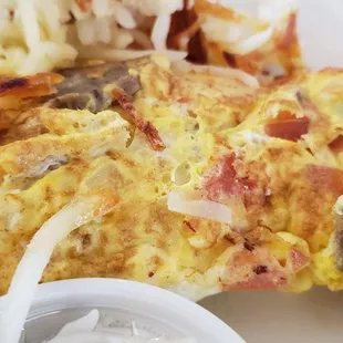 an omelet and potatoes