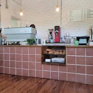 Quaint little counter with local pastries, friendly smiles, and good coffee!