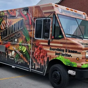 a food truck parked in a parking lot